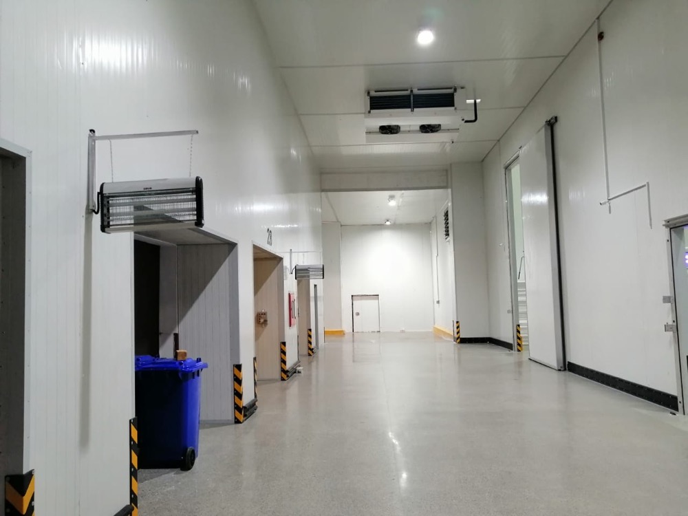 3PL cold-chain logistics warehouse interior at Connect Logistics Karachi — pallet racking, refrigeration ductwork overhead