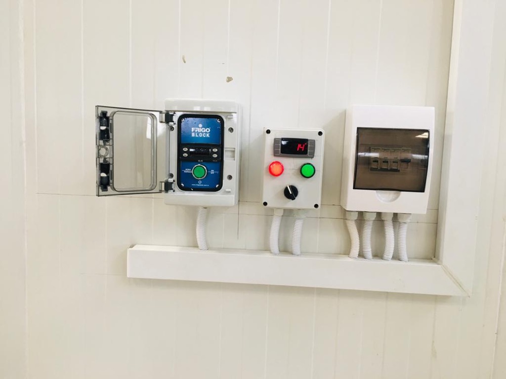 Banana ripening room control panel and refrigerant piping detail at the Sindh USAID cold storage installation