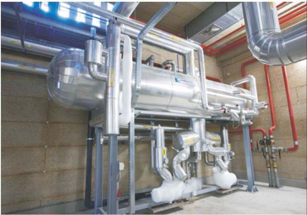 Industrial ammonia glycol refrigeration plant room with stainless-steel plate evaporators