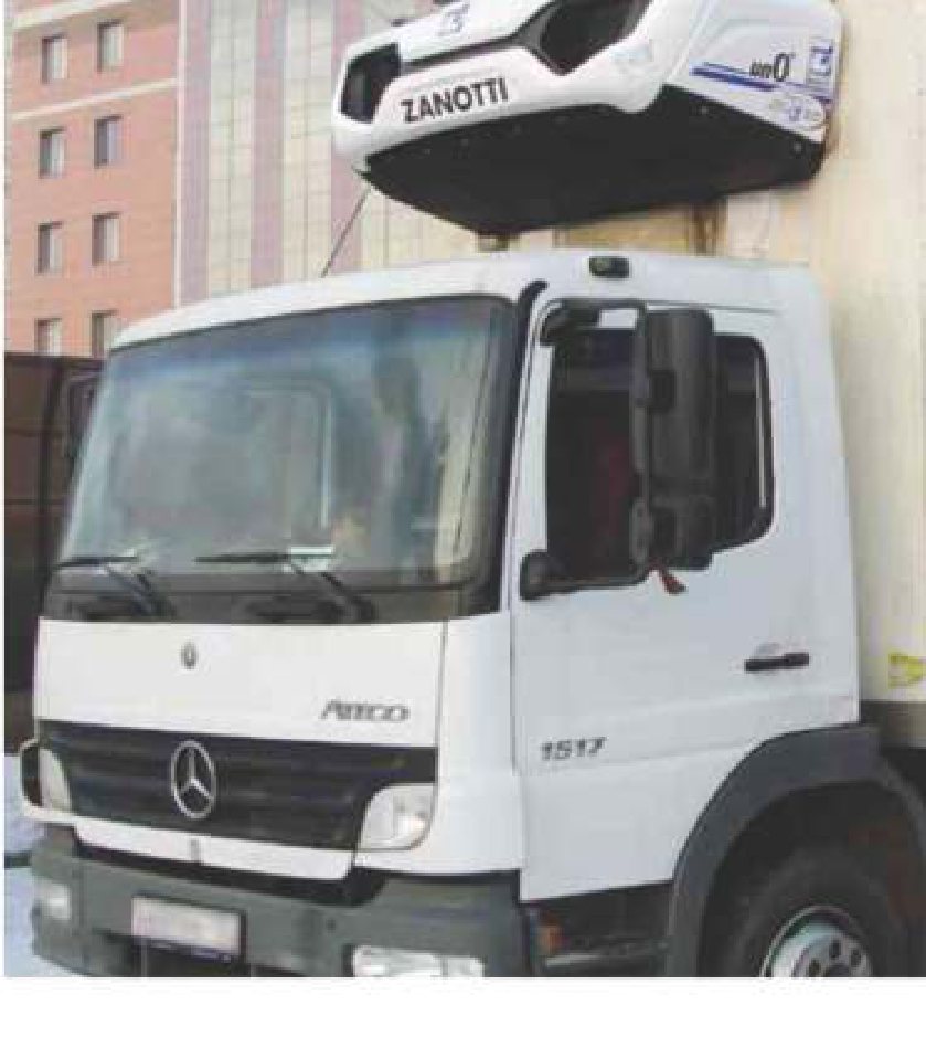 Zanotti roof-mounted refrigeration unit installed above the cab of a rigid reefer truck
